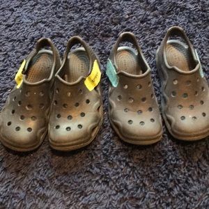 2 pairs of Crocs